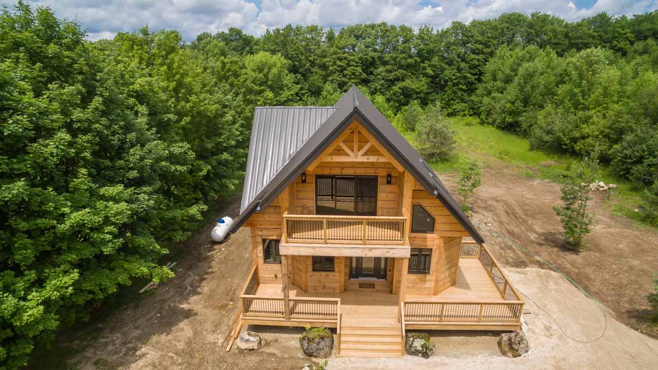 Log Cabin style of home in the wooded area